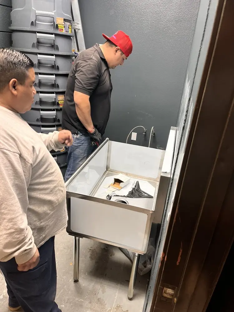 Commercial plumbing and sink installation in Corona